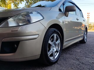2012 Nissan Tiida I Рестайлинг, бежевый, 865000 рублей, вид 2
