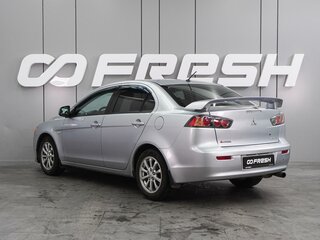 2011 Mitsubishi Lancer X Рестайлинг, серебристый, 819000 рублей, вид 2