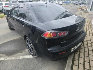 2012 Mitsubishi Lancer X Рестайлинг, чёрный, 799000 рублей, вид 3
