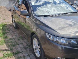 2010 Kia Cerato 6-speed II, золотистый, 1050000 рублей, вид 2