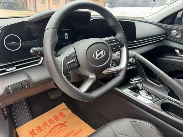2023 Hyundai Elantra N Line VII (CN7) Рестайлинг, белый - вид 4