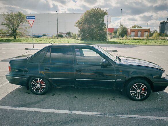 2006 Daewoo Nexia I, синий - вид 1