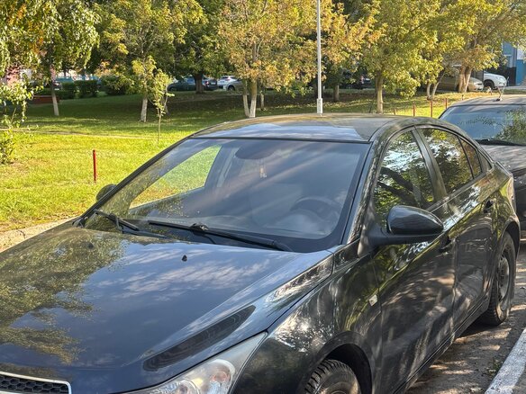 2010 Chevrolet Cruze I, чёрный, 585000 рублей