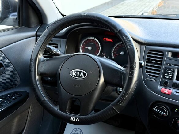 2010 Kia Rio II Рестайлинг, серебристый - вид 16