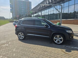 2014 Volkswagen Tiguan I Рестайлинг, чёрный, 1259000 рублей, вид 2