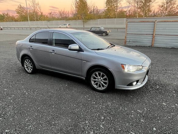 2012 Mitsubishi Lancer X Рестайлинг, серебристый, 720000 рублей - вид 6