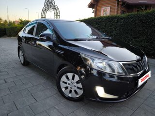 2013 Kia Rio 4-speed III, чёрный, 815000 рублей, вид 1