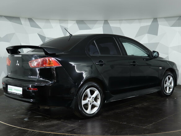 2012 Mitsubishi Lancer X Рестайлинг, чёрный, 725000 рублей - вид 4