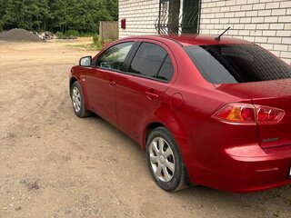 2008 Mitsubishi Lancer X, красный, 750000 рублей, вид 5