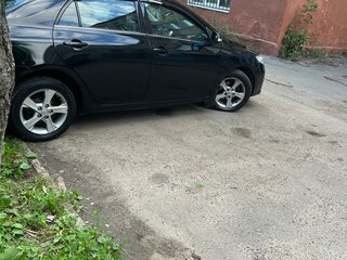 2010 Toyota Corolla X (E140, E150) Рестайлинг, чёрный, 680000 рублей, вид 4