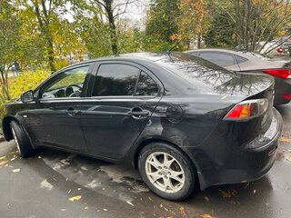 2012 Mitsubishi Lancer X Рестайлинг, чёрный, 590000 рублей, вид 2