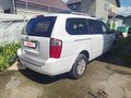 2010 Kia Carnival Grand II, белый, 1490000 рублей - вид 1