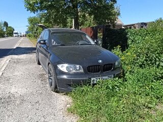 2009 BMW 1 серии 116i I (E81/E82/E87/E88) Рестайлинг, чёрный, 1000000 рублей, вид 1