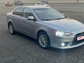2012 Mitsubishi Lancer X Рестайлинг, серебристый, 720000 рублей, вид 4