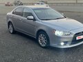 2012 Mitsubishi Lancer X Рестайлинг, серебристый, 720000 рублей - вид 3