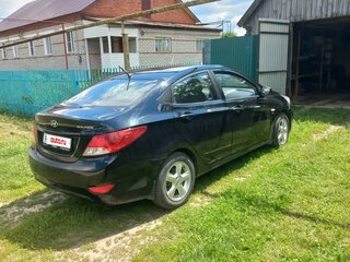 2011 Hyundai Solaris I, чёрный, 790000 рублей, вид 4