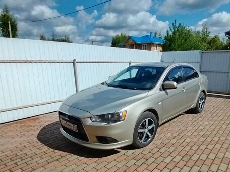 2011 Mitsubishi Lancer X Рестайлинг, бежевый, 600000 рублей, вид 5