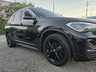 2022 BMW X1 18d xDrive II (F48) Рестайлинг, чёрный, 2390777 рублей, вид 4