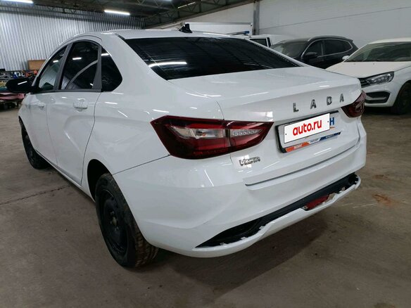 2023 Lada (ВАЗ) Vesta I Рестайлинг (NG), белый, 824112 рублей - вид 3