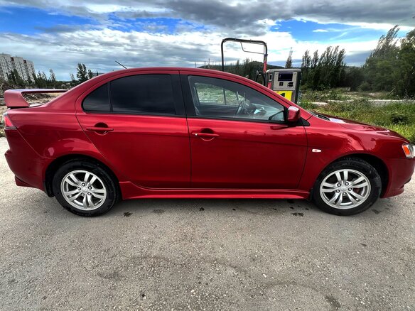 2012 Mitsubishi Lancer X Рестайлинг, красный, 1050000 рублей - вид 3