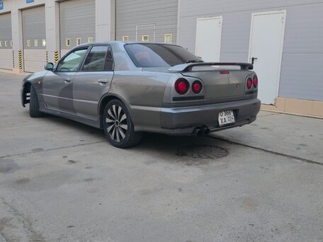 1998 Nissan Skyline X (R34), серебристый, 599990 рублей, вид 5