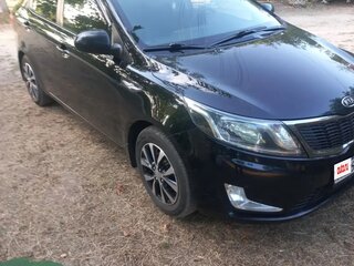 2012 Kia Rio 5-speed III, чёрный, 820000 рублей, вид 3