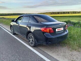2008 Toyota Corolla X (E140, E150), чёрный, 620000 рублей, вид 2