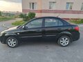 2010 Kia Rio II Рестайлинг, чёрный, 380000 рублей - вид 4