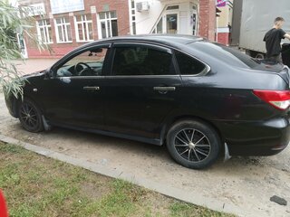 2014 Nissan Almera III (G15), чёрный, 750000 рублей, вид 3