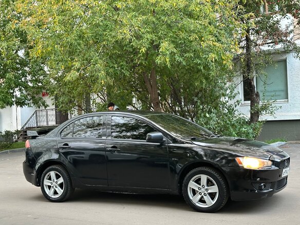 2008 Mitsubishi Lancer X, чёрный - вид 2