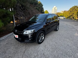 2016 Volkswagen Tiguan I Рестайлинг, чёрный, 1745000 рублей, вид 2