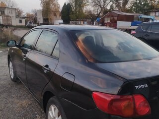 2008 Toyota Corolla X (E140, E150), чёрный, 640000 рублей, вид 3