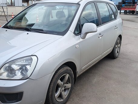 2009 Kia Carens II (UN), серый, вид 1