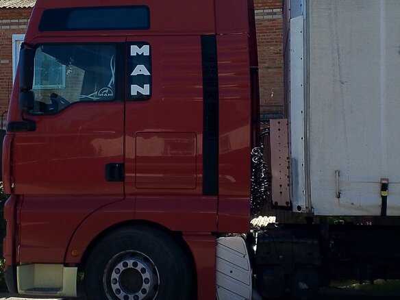 2003 MAN TGA, красный, 1450000 рублей - вид 9