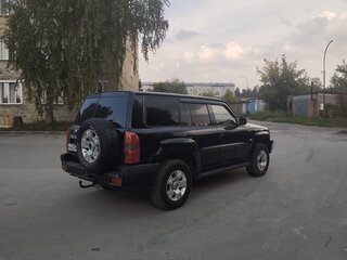 2005 Nissan Patrol V (Y61) Рестайлинг, чёрный, 1520000 рублей, вид 4