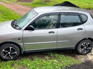 1999 Daihatsu Storia I (M100), жёлтый, 200000 рублей, вид 3