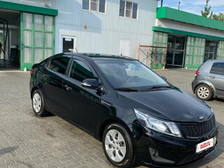2014 Kia Rio 6-speed III, чёрный, 790000 рублей, вид 2