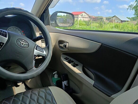 2010 Toyota Corolla Axio X (E140, E150) Рестайлинг, серый, 800000 рублей - вид 13