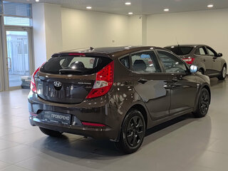 2015 Hyundai Solaris I Рестайлинг, коричневый, 934000 рублей, вид 5