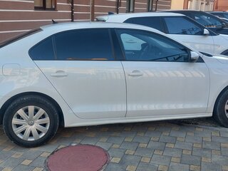 2016 Volkswagen Jetta VI Рестайлинг, белый, 1260000 рублей, вид 4