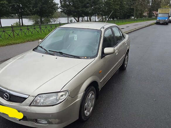 2001 Mazda 323 VI (BJ) Рестайлинг, серый, 110000 рублей
