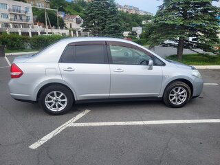 2009 Nissan Tiida Latio I, серебристый, 625000 рублей, вид 4