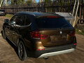 2010 BMW X1 20d I (E84), коричневый, 900000 рублей - вид 4
