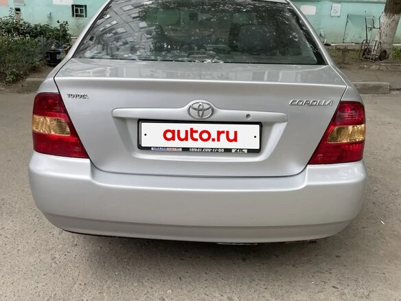 2003 Toyota Corolla IX (E120, E130), серебристый - вид 2