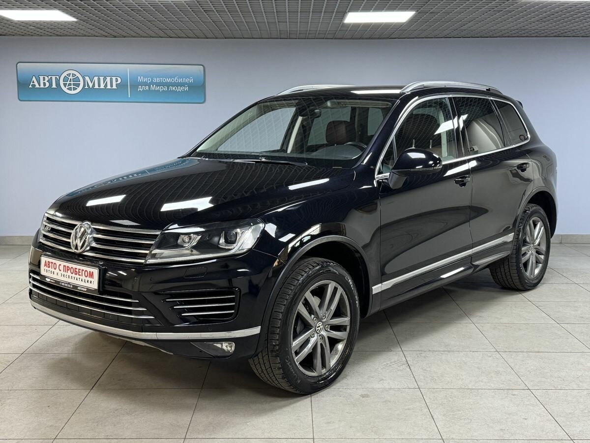 Открыть фотографии: Volkswagen Touareg II Рестайлинг