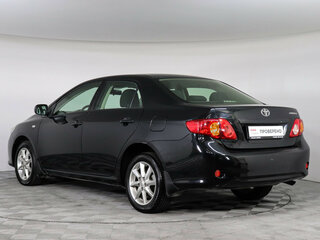 2010 Toyota Corolla X (E140, E150) Рестайлинг, чёрный, 999000 рублей, вид 4