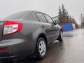 2010 Suzuki SX4 I (Classic) Рестайлинг, серый, 800000 рублей - вид 3