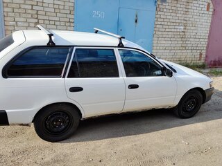 1999 Toyota Corolla VII (E100), белый, 320000 рублей, вид 4