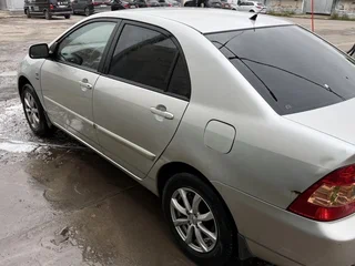 2005 Toyota Corolla IX (E120, E130) Рестайлинг, серебристый, 415000 рублей, вид 5