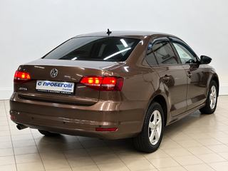 2016 Volkswagen Jetta VI Рестайлинг, коричневый, 1580000 рублей, вид 4